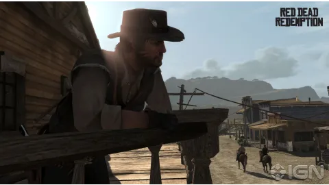 Marston watching from a balcony