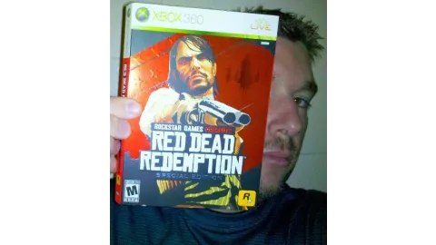 Me holding the special edition of \RDR"for XBOX."""